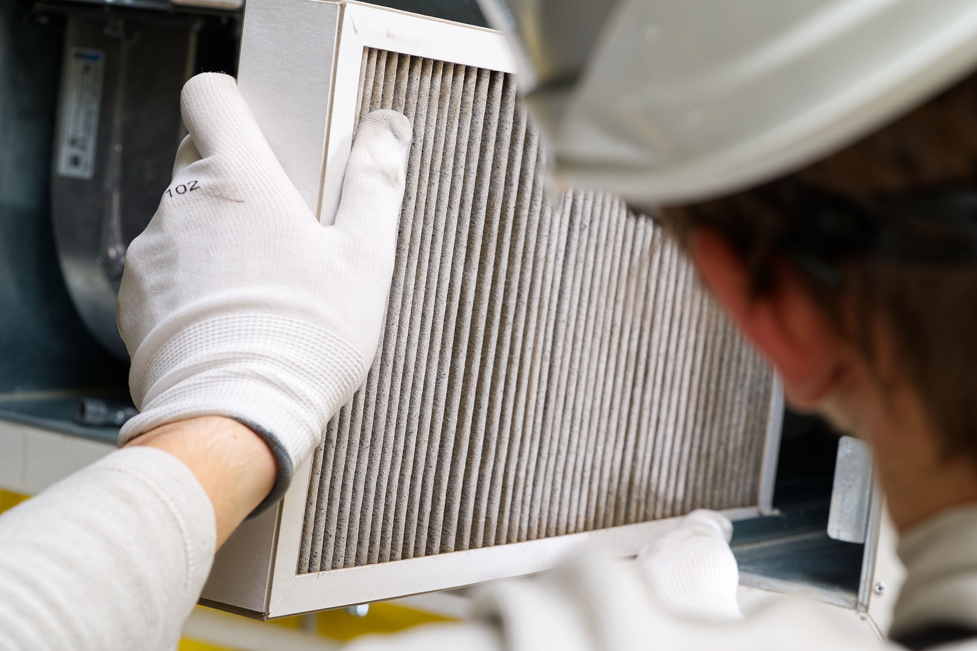 Replacing filter in the central ventilation system. hvac filter replacing home central air system